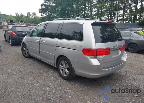 2010 Honda Odyssey Touring from USA, damaged, VIN 5FNRL3H9XAB090134